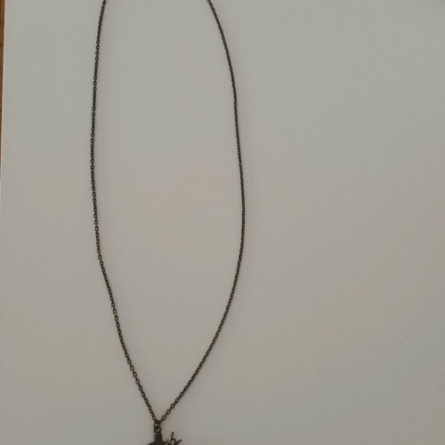 Necklace with rabbit and flower pendant