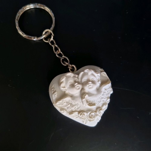 Plaster keychain with angels from Florence
