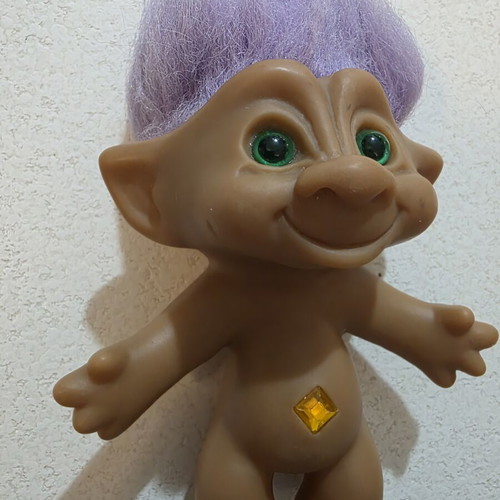 Efxoulis collectible with diamond, 1980s, used, trimmed hair