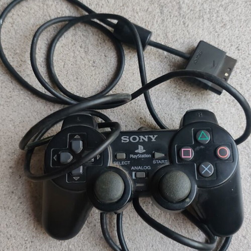 PlayStation 2 controller authentic used, functional