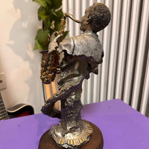 Vintage Jazz Saxophonist Figurine on Wooden Base like new