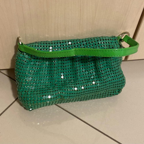 Migato green hand bag like new, satin interior