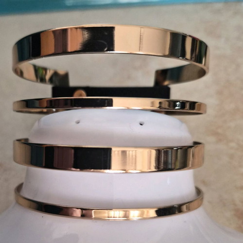 Metal cuff bracelet in rose gold color with black details like new