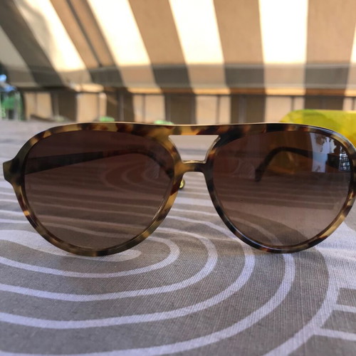 Michael Kors sunglasses used tortoise brown with gradient lenses
