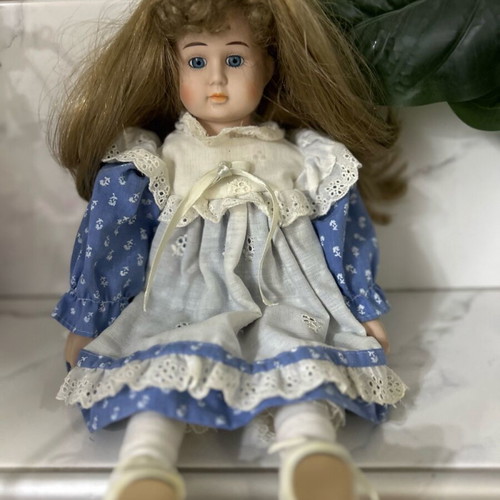Porcelain doll Germany from the 70s like new