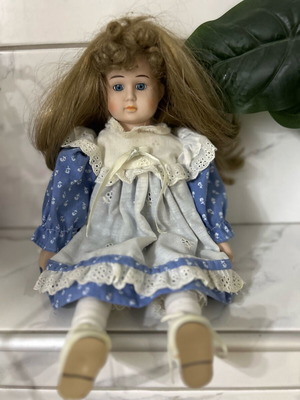 Porcelain doll Germany from the 70s like new