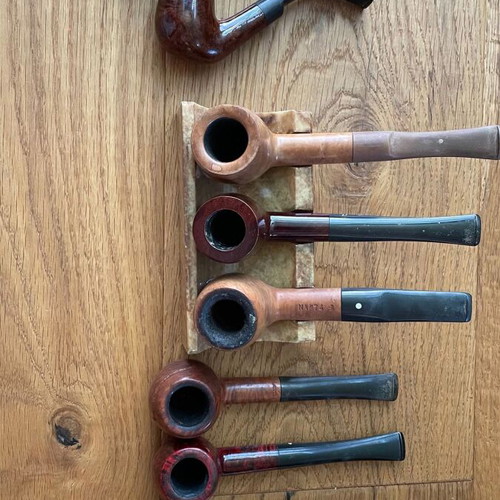 Smoking accessories like new, pipes, stands, pouches and cleaning tools