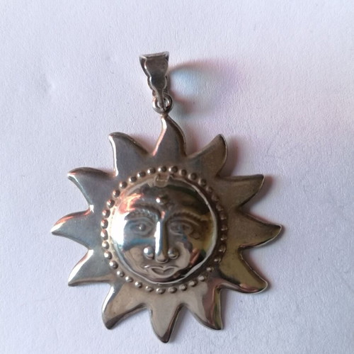 Silver 925 sun pendant new with embossed face
