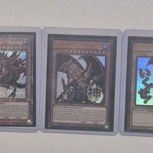 Yu-Gi-Oh! cards Slifer the Sky Dragon, Red-Eyes Black Dragon, Winged Dragon of Ra like new