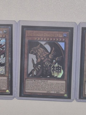 Yu-Gi-Oh! cards Slifer the Sky Dragon, Red-Eyes Black Dragon, Winged Dragon of Ra like new