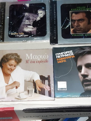 Sealed unused CDs, pack of 7
