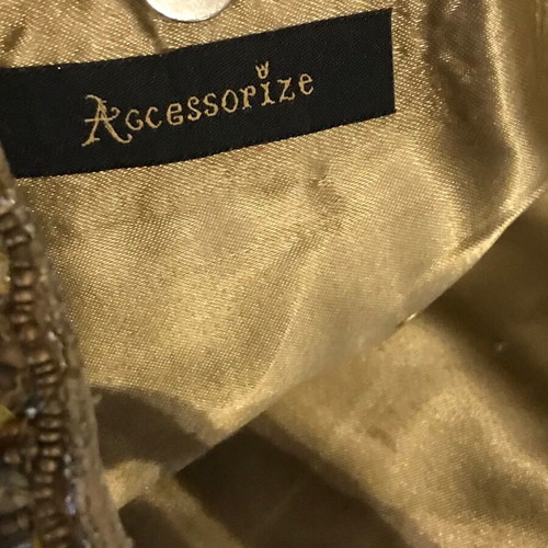 Small shoulder bag in gold colors like new