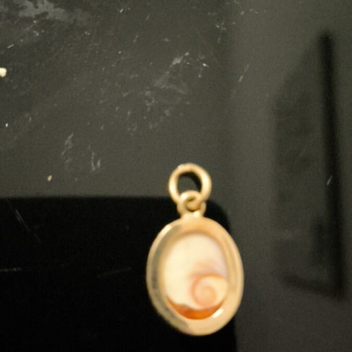 Gold-plated pendant with evil eye like new