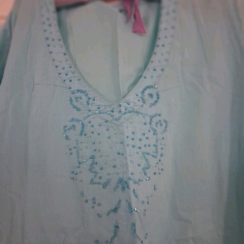 Turquoise tunic used with beads on neck and sleeves, one size