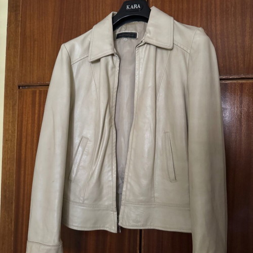 Leather beige mid-length jacket like new