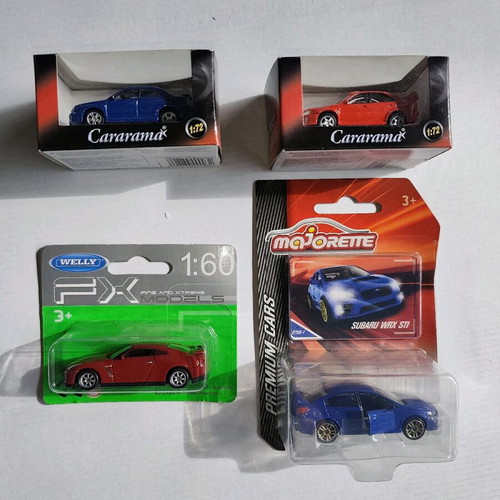Set of 4 sport diecast cars new, various sizes