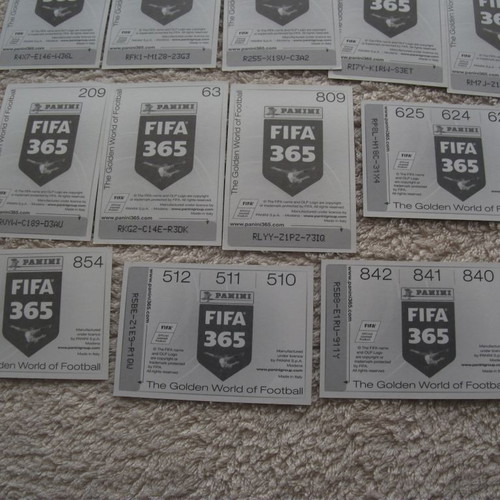 Panini FIFA 365 stickers like new, set of 32 with gold accents