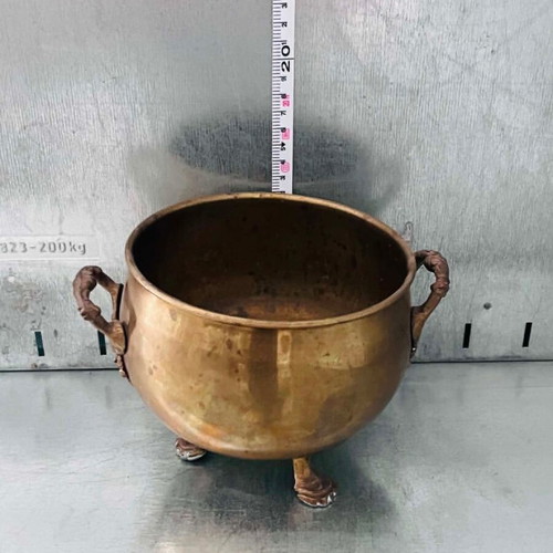 Vintage brass planter with lion claw feet used