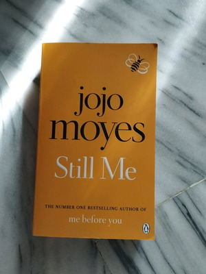 Still Me by Jojo Moyes like new, with broken spine