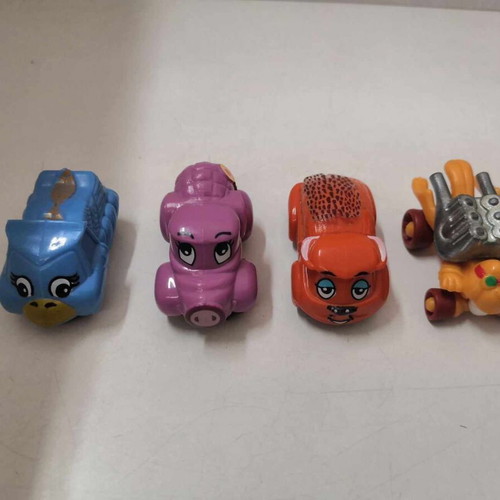 Small animal figures with wheels like new