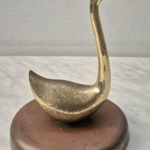 Decorative brass duck on iron base used