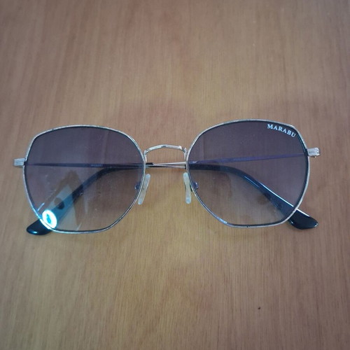 Sunglasses used, gold and blue unisex