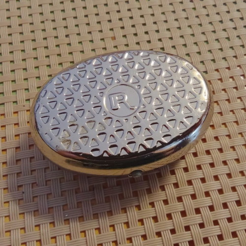 Vintage metal pill box with enamel and monogram X, like new
