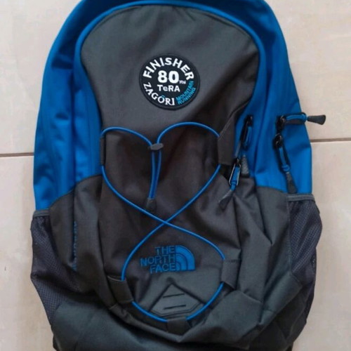 The North Face backpack brand new, black and blue