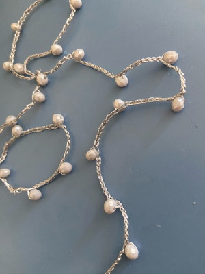Knitted necklace new with silver thread and iridescent beads