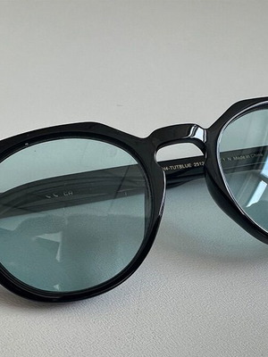 Meller Sunglasses New Black Frame Turquoise Lenses