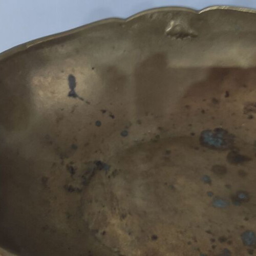 Vintage decorative brass bowl with two handles and wavy rim