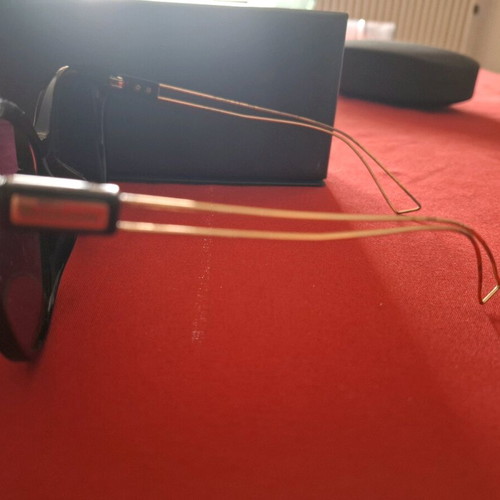 Black sunglasses with gold detail