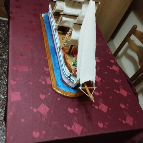 Handmade sailboat on base new with three masts