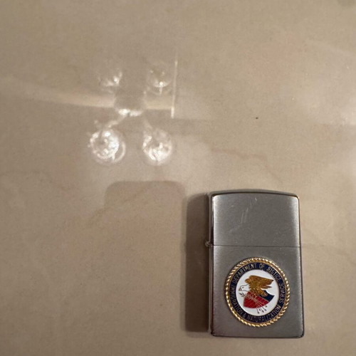 Zippo collectible lighter new with Department of Justice DOJ FBI case