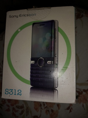 Sony Ericsson S312 collectible packaging like new with phone papers