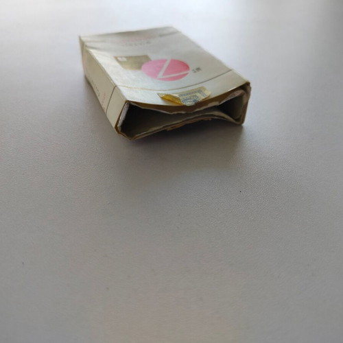 Empty No7 Papastratos cigarette pack used, soft pack