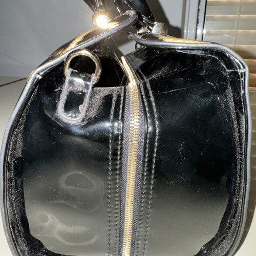 Tom & Eva Leopard Pri handbag like new, glossy synthetic