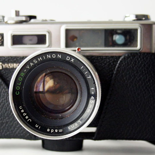 Yashica Electro 35 camera used with flash and case