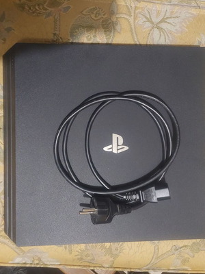 PlayStation 4 Pro 1TB model CUH 7116B like new with 7 games