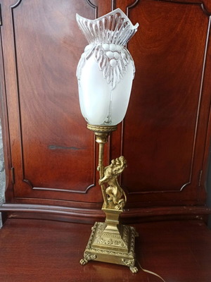 Brass lamp with lion figure restored