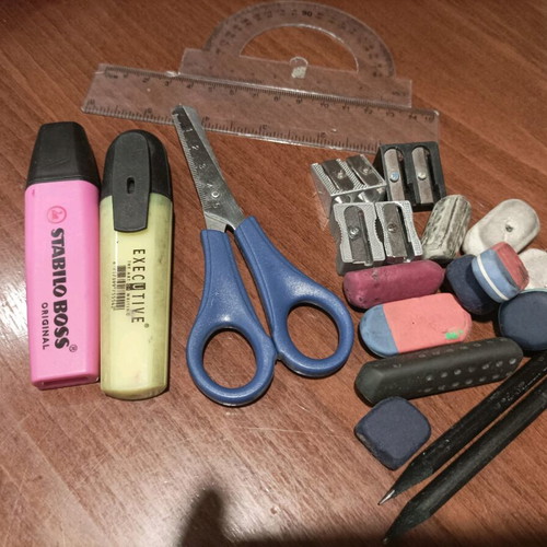 Various school supplies used with Giotto markers and pencil cases