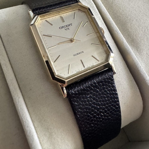 Orient VX Quartz watch, vintage gold rectangular case, brown leather strap