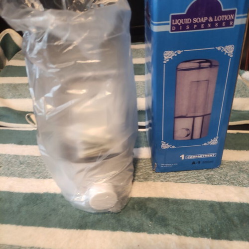 Wall-mounted dispenser new