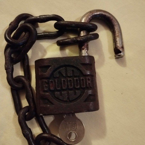 Padlock used with key, chain and skeleton key