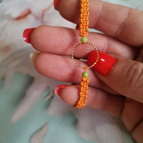 Reflection of the sun bracelet with artificial macrame, beads and metal element, new
