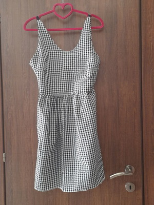 Black and white checkered cocktail dress with back tie