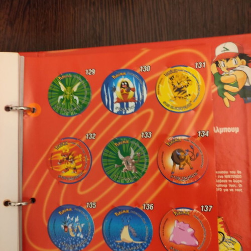 Pokemon tazos complete set with album