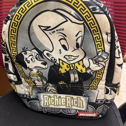Sprayground Richie Rich backpack with laptop compartment