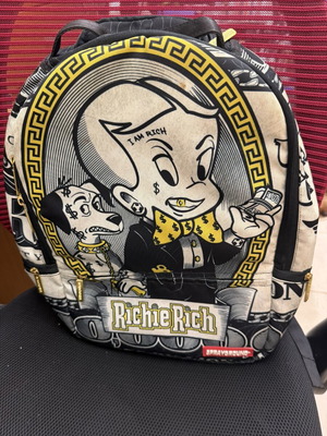 Sprayground Richie Rich backpack with laptop compartment