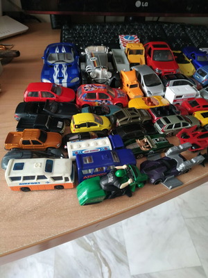Iron toy cars like new, pack of 57 with engines